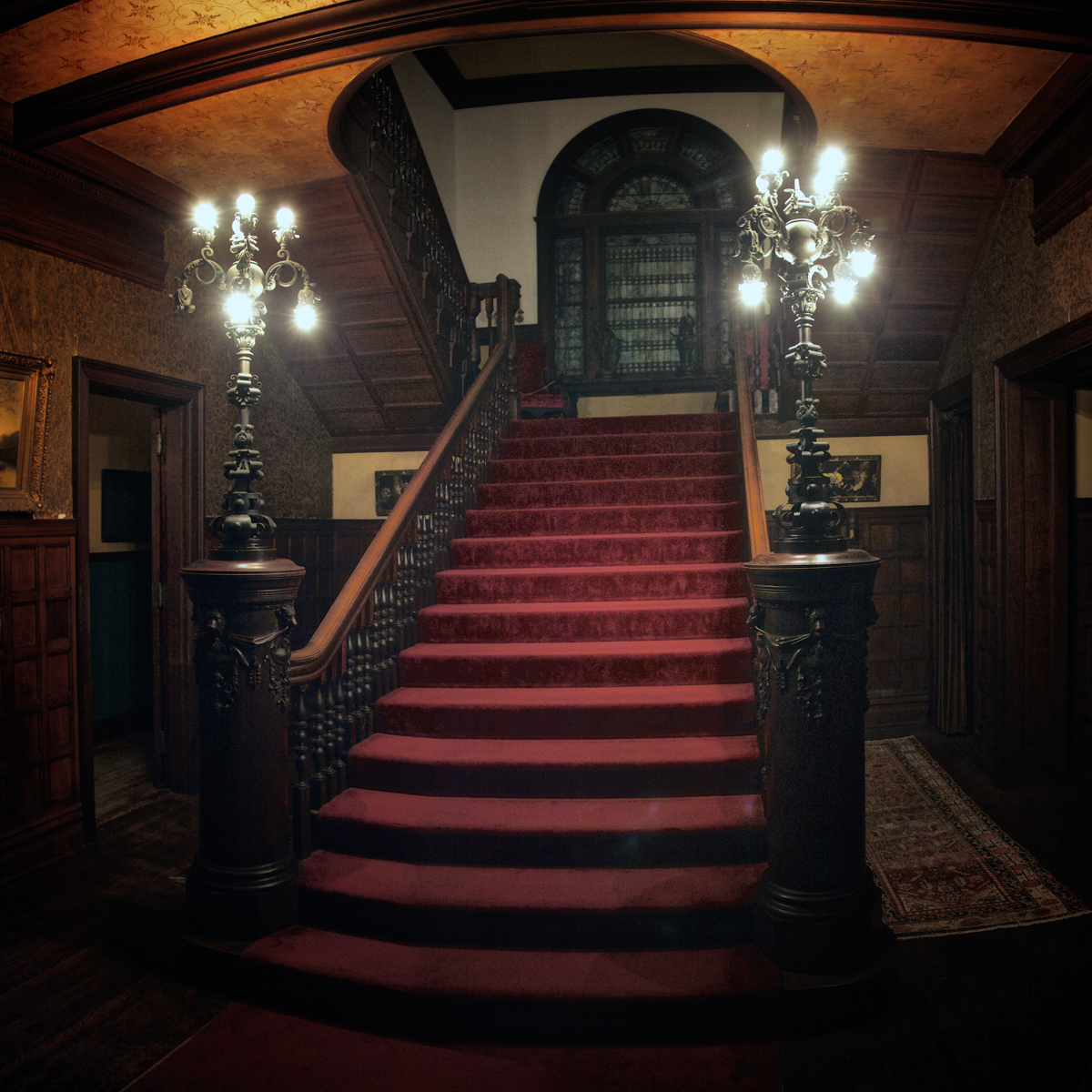 The main staircase at night, where Mark Twain spoke at Rockcliffe Mansion