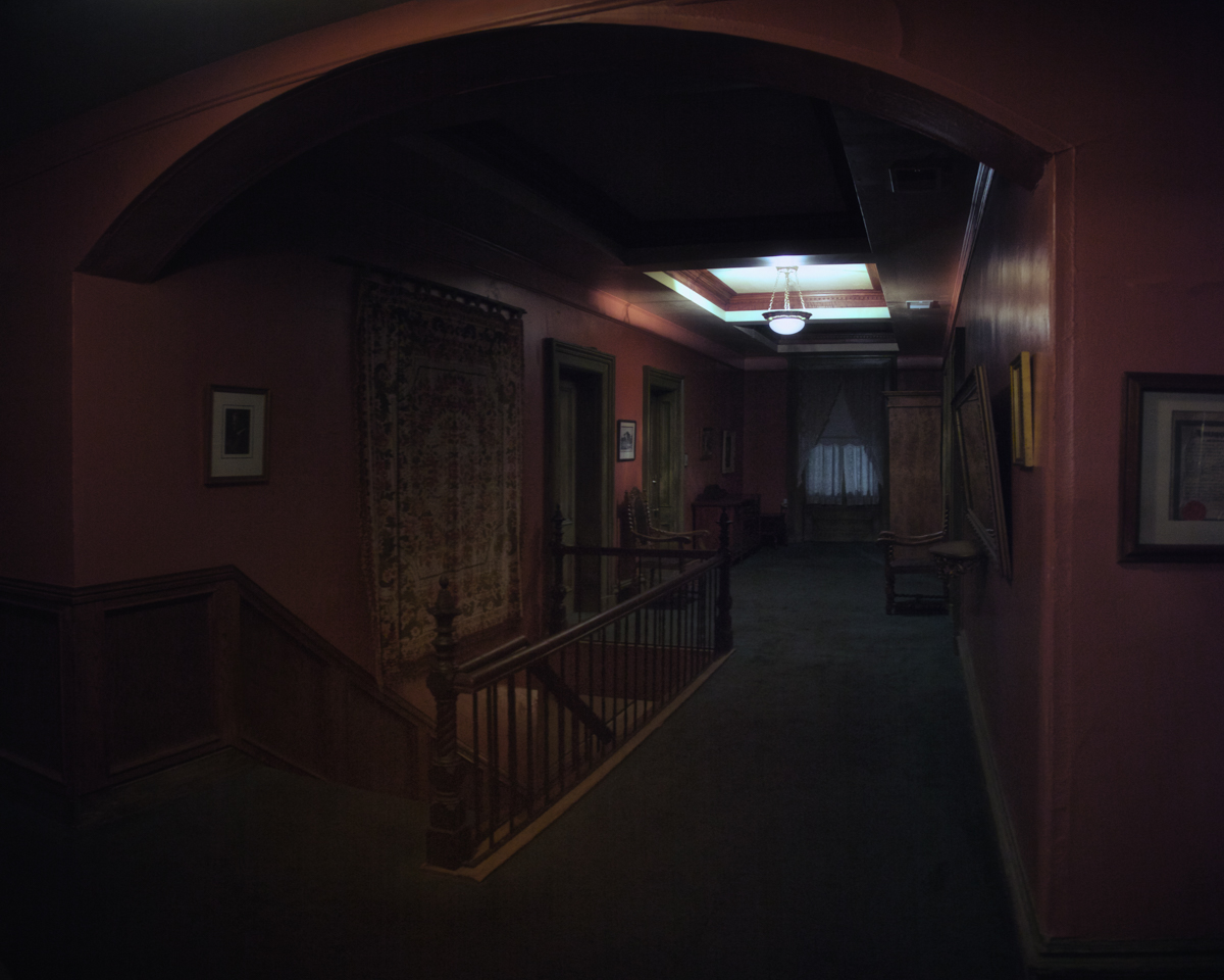 William Lemp shot himself in the room to the left, his son in the room at the foot of the steps. The bedroom to the right has the site of many of Billy Lemp's debauches, and where he kept a loaded revolver under his pillow, pointed at his wife. Billy's illegitimate son who suffered from Down's Syndrome fell to his death at the foot of the stairs to the right (hidden), and behind us is the room where Charles Lemp killed himself.