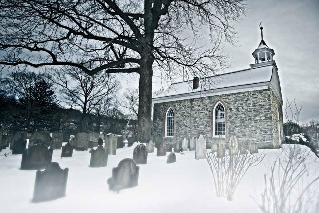 The Old Dutch Church and burial ground of Sleepy Hollow, legendary in American folk horror from Haunted Travels in the Hudson River Valley of Washington Irving